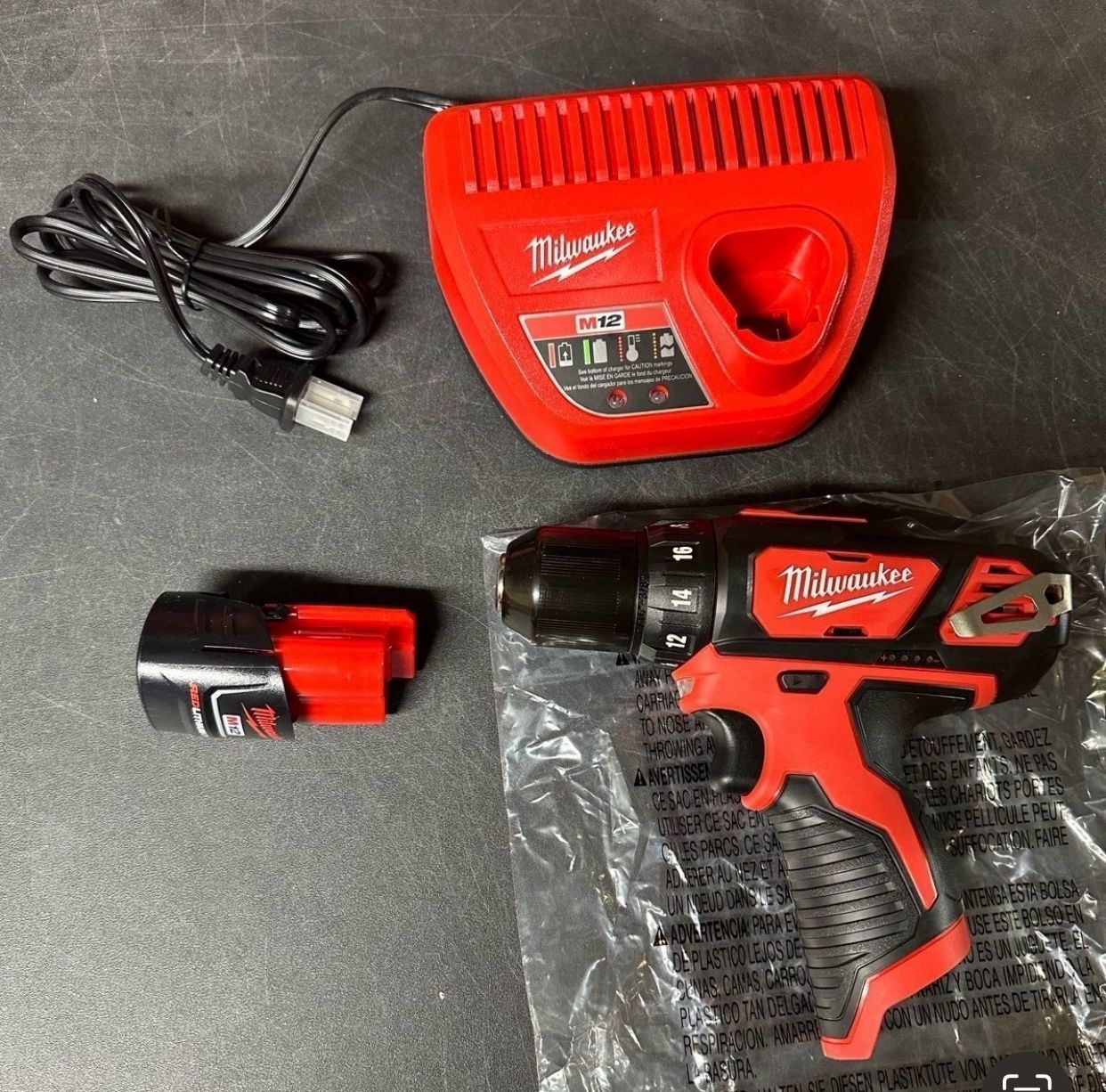 Milwaukee New Kit 1/4” Drill M12 And Battery , Charger