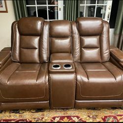 The Espresso Man-Den Power Reclining Loveseat With Console
Ashley Furniture