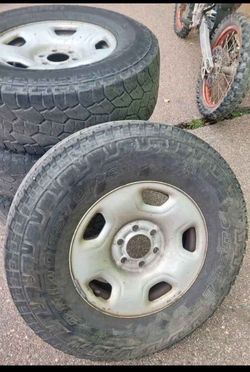 (4) LT 285 70/R17 Bridgestone Dueler A/T Revo 3 Tires And Ford 17" X 7.5",6 Lug X 135mm(5.3") Wheels