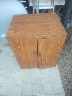 Sewing machine in cabinet