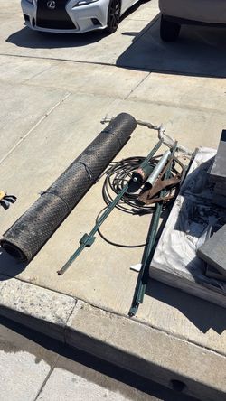 . Scrap metal/wire, rubber truck bed rug
