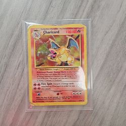 Charizard 4/102 Base Set First Edition Halo RARE.