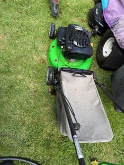 Rear propelled bagger mower