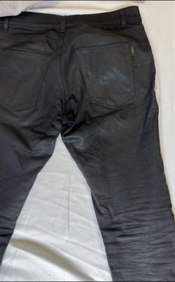 Saint laurent waxed jeans top