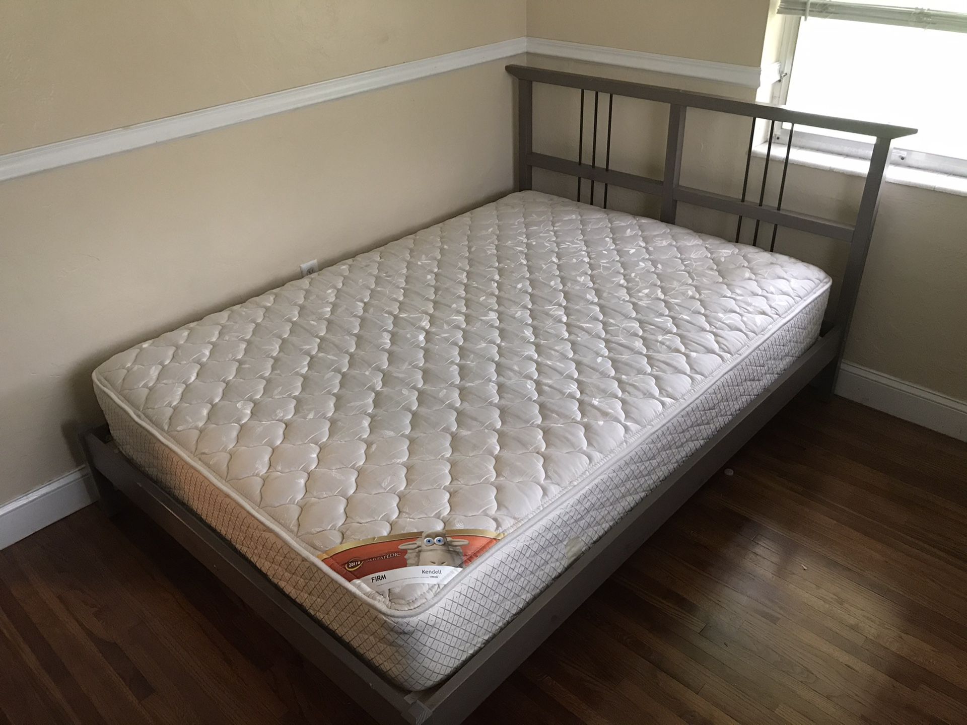 Full size IKEA Bed frame and mattress. Excellent condition used 1 month