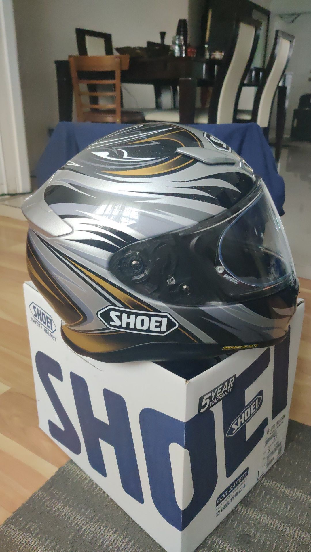 Shoei helmet size s brand new with transition visor ( gets darker with the sun and clear and night time