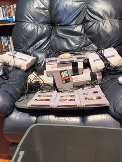 3 Nintendo NES Consoles And 2 Super Nintendo Consoles With 22 Games