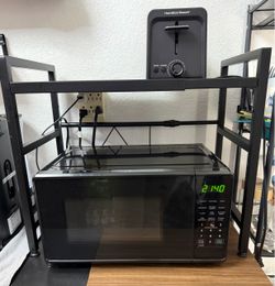 Black Countertop Microwave Oven, Shelf, and Toaster