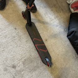 The Super Scooters It A Black Scooter It Brand New I Don’t Know What It I’d Called But It Brand New 