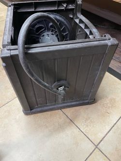 Brown Water hose hideaway