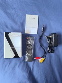 Portable LED Projector – New
