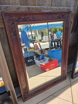 Vintage decorative carved wood mirror