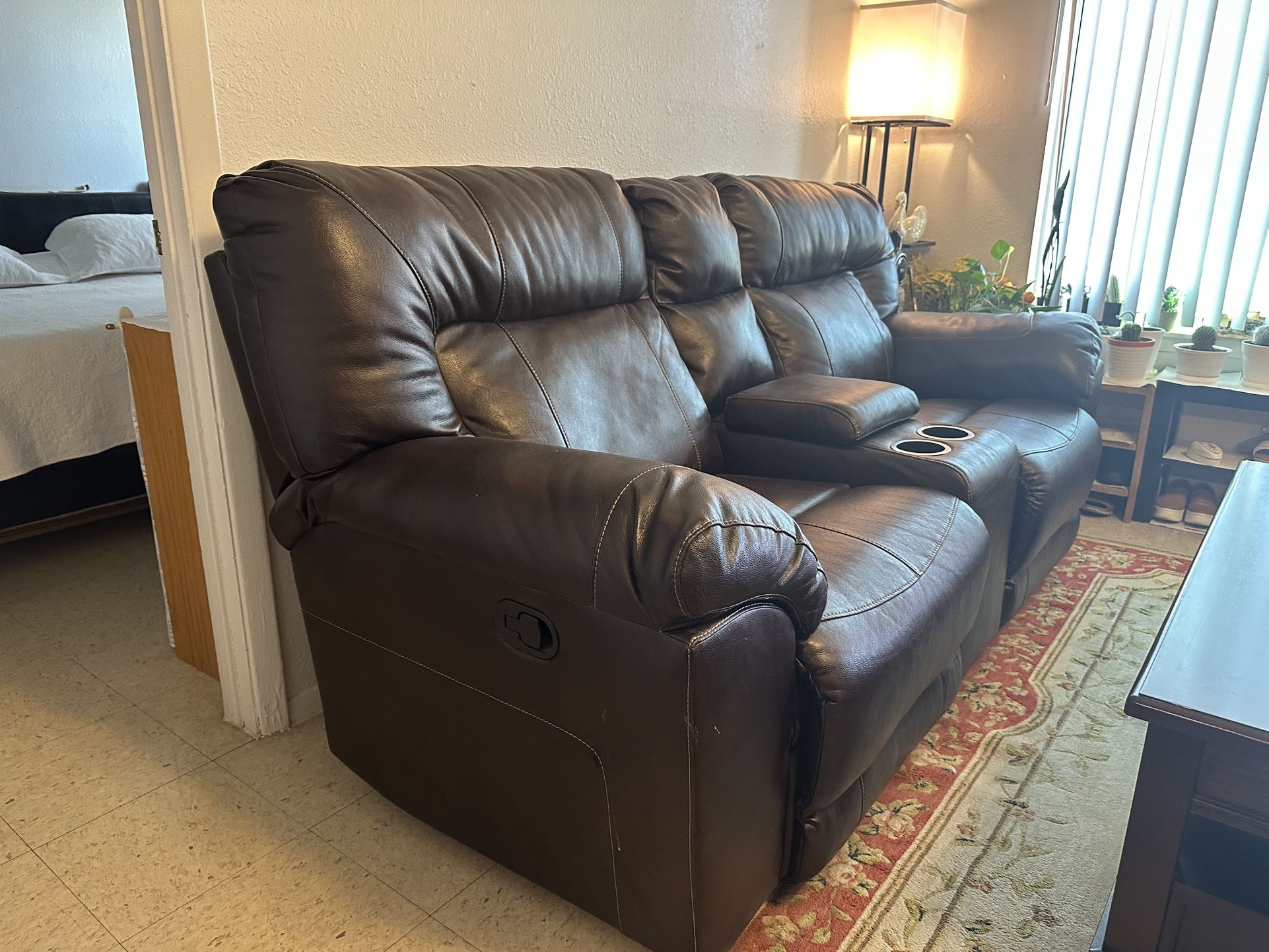 Leather Reclining Sofa - Like New