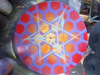 Spray painted repurposed vinyl albums $15 each $20 for 2. Local custom hand painted art.
