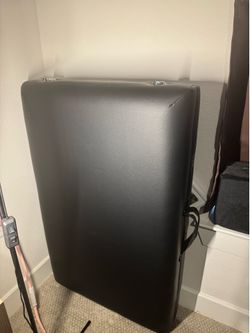 Massage table