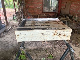 Truck bed slide out tool box