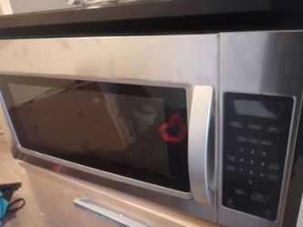 .Whirlpool1.​7 cu.​ ft.​ Over the Range Microwave in Stainless Steel with Electronic Touch Controls