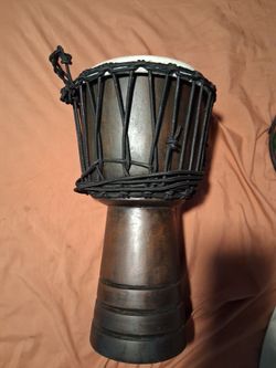 18 inch tall bongo drum wood body rope net structure like new condition