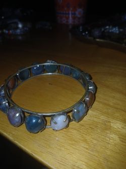 Silver bracelet with stones