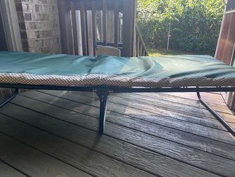 Coleman single person cot w pad