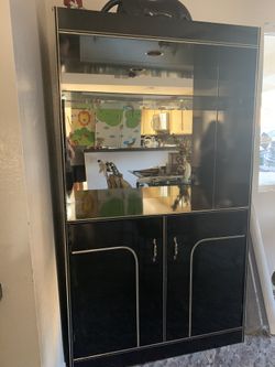 Storage cabinet with shelves and double doors