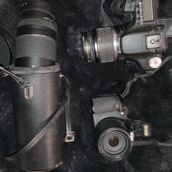 A cannon BS 50 D photography camera and a Nikon cool pics P520 With A Canon 75-300 millimeter lens