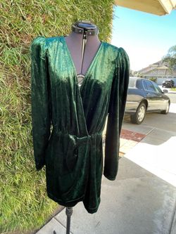 Women’s and green velvet cocktail dress