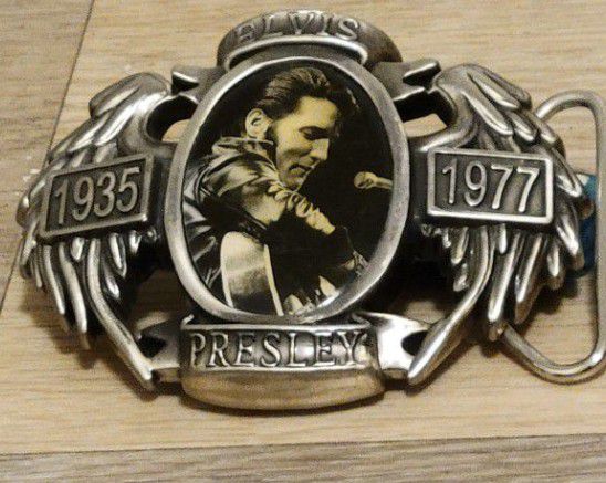 Super awesome belt buckle, featuring the King! Swap out your old, tired buckle.. .