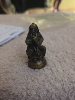 Brass-tone Chess Piece