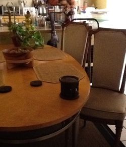 Beautiful oval dining table ,4 clean tan velvet chairs.moving out need them gone.