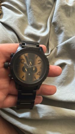 Nixon two toned face watch