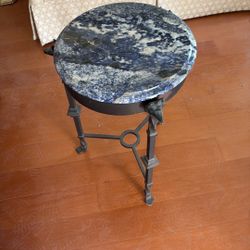 a blue sodalite-topped metal side Table 