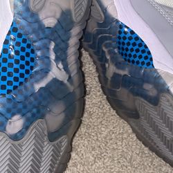 Low Jordan 11 Cement Grey