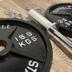 BRAND NEW: Olympic 47 Inch steel Curl Bar With Cast Iron Plates 35s, 25s, 10s  and 5s Lbs total: 165 lbs
