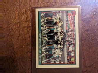 Dolphin trading cards Stoyanovich kicks it through