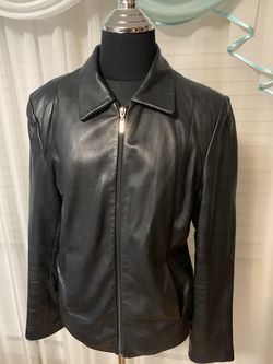 Wilson’s leather jacket . Women size m