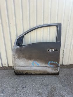NISSAN TITAN ( 2016 2017 2018 2019 2020 2021 2022 2023 2024 ) Front door shell left driver side LH used original OEM
