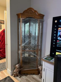 Howard Miller Corner Curio Cabinet