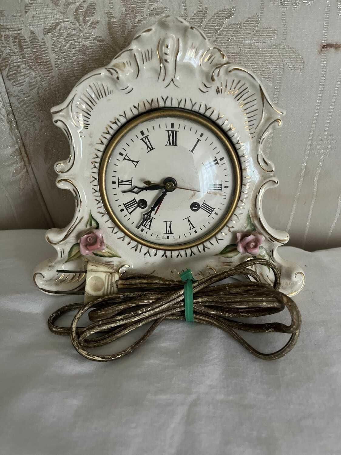 Porcelain clock maybe antique/collectibleMade in America approx H6” X W 7”