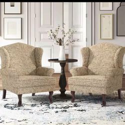 Paisley Brown Linen Wood Legs Upholstered Accent Arm Chair with Wingback (Set of 2).   retail price $524 our price $220   Note :- 1 leg has a tiny den
