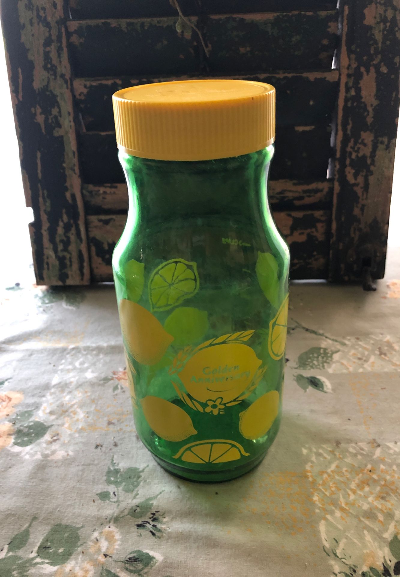 Vintage golden anniversary juice jar