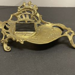 Brass inkwell missing dipping pot which could be replaced with glass container.  8” wide. 