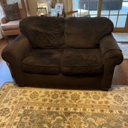 Loveseat And Ottoman With Pillows