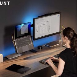 Laptop and monitor stand. Stand and lightly used 32" monitor for sale.