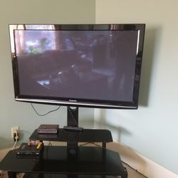 Panasonic TV With Glass Stand 