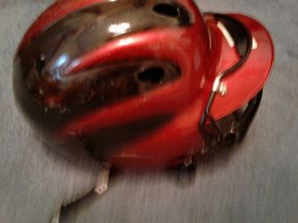 Wilson bran helmet with face guard model WTA 5226 size range 6 and 3 quarters and 7 and three quarters