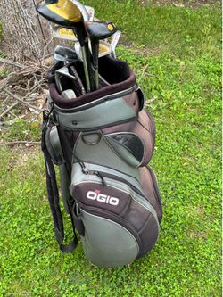 Ogio cart bag with various different sizes clubs