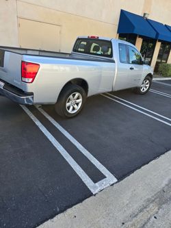 WORK TRUCK ,WORK TRUCK 
2008 Nissan titan FLEXFUEL
Runs very good
AC WORKS
NEW TIRES
Automatic 
Motor V8
scratches here and there ,but is a WORK TRUCK