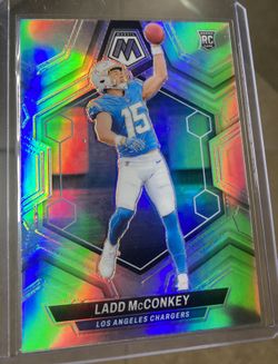 2024 Panini Mosaic Ladd McConkey #334 Silver Prizm (RC) LA Chargers Rookie Card. Great card ready to grade .
