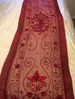 Red sequins table runner